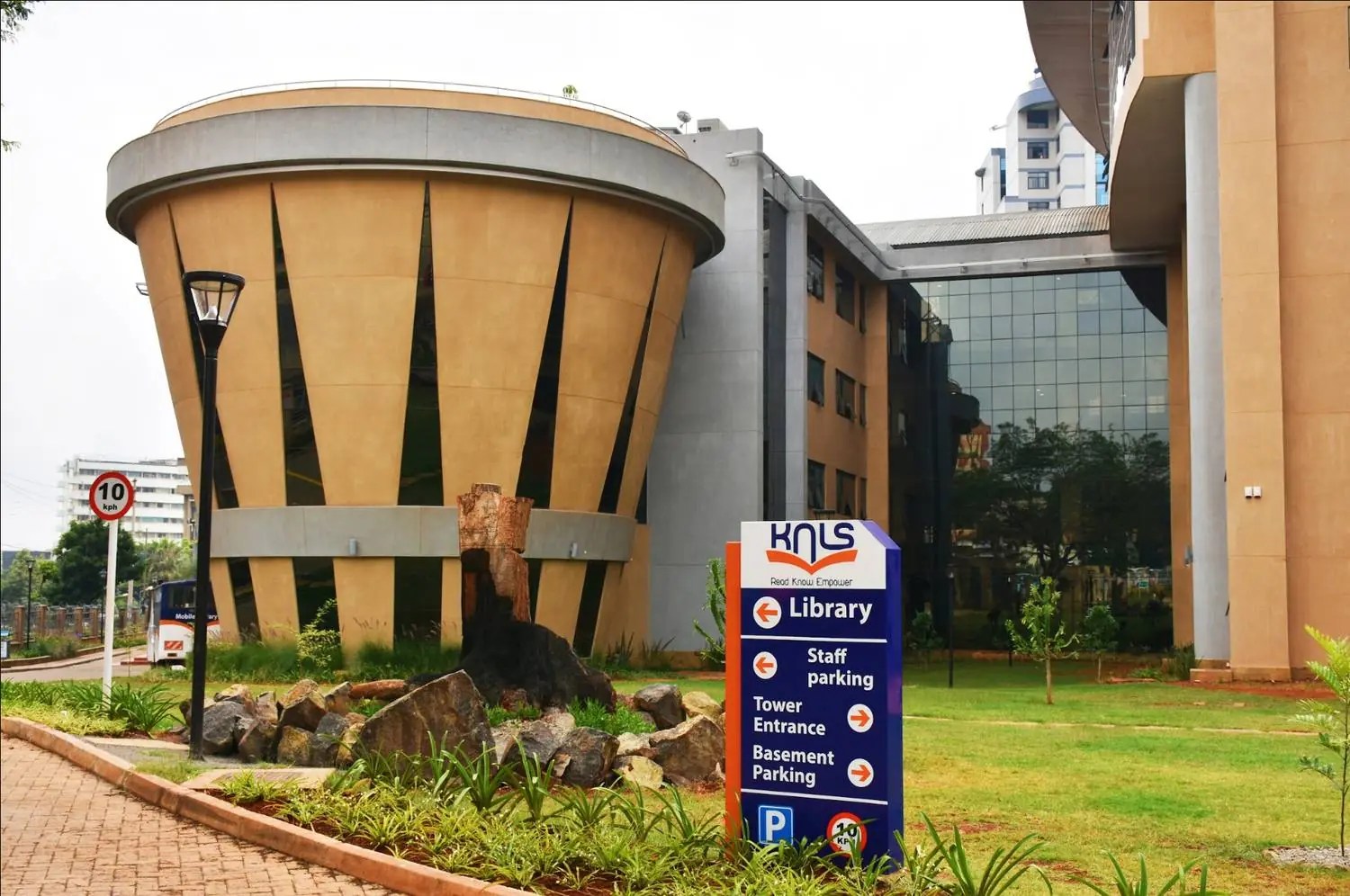 KNLS library direction banner and building entrance